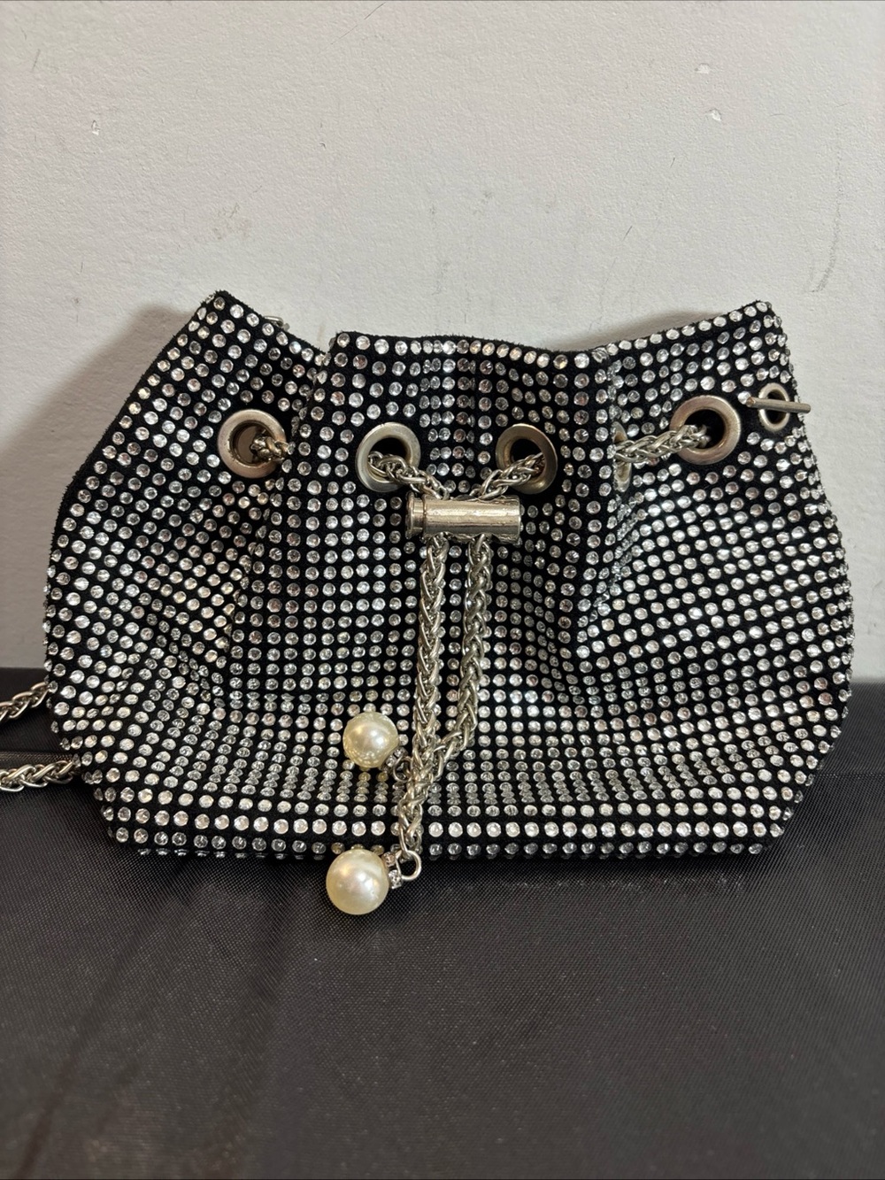 Anna & Elle Crystal-Embellished Black Drawstring Shoulder Bag. 9/12
